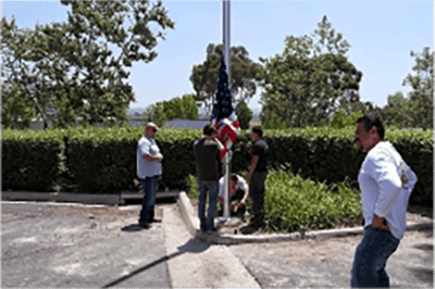 Photo of the raising of the American Flag Ceremony at TCWGlobals office at Kearny Mesa