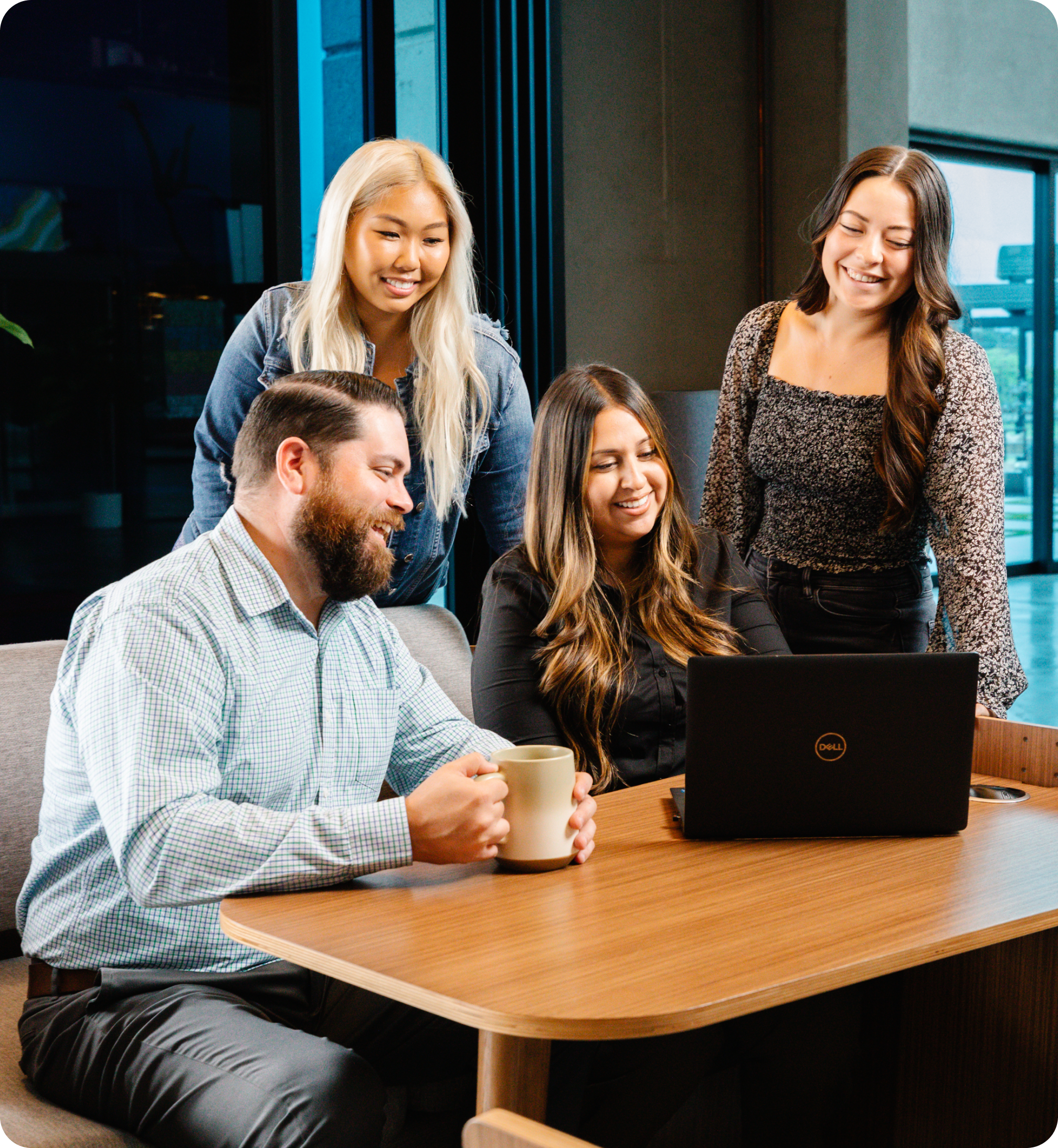 TCWGlobal Implementation Specialists meeting with a colleague