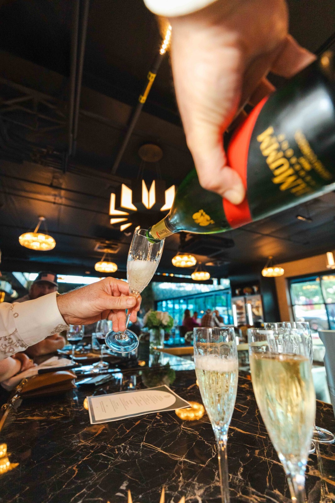 Champagne on us!